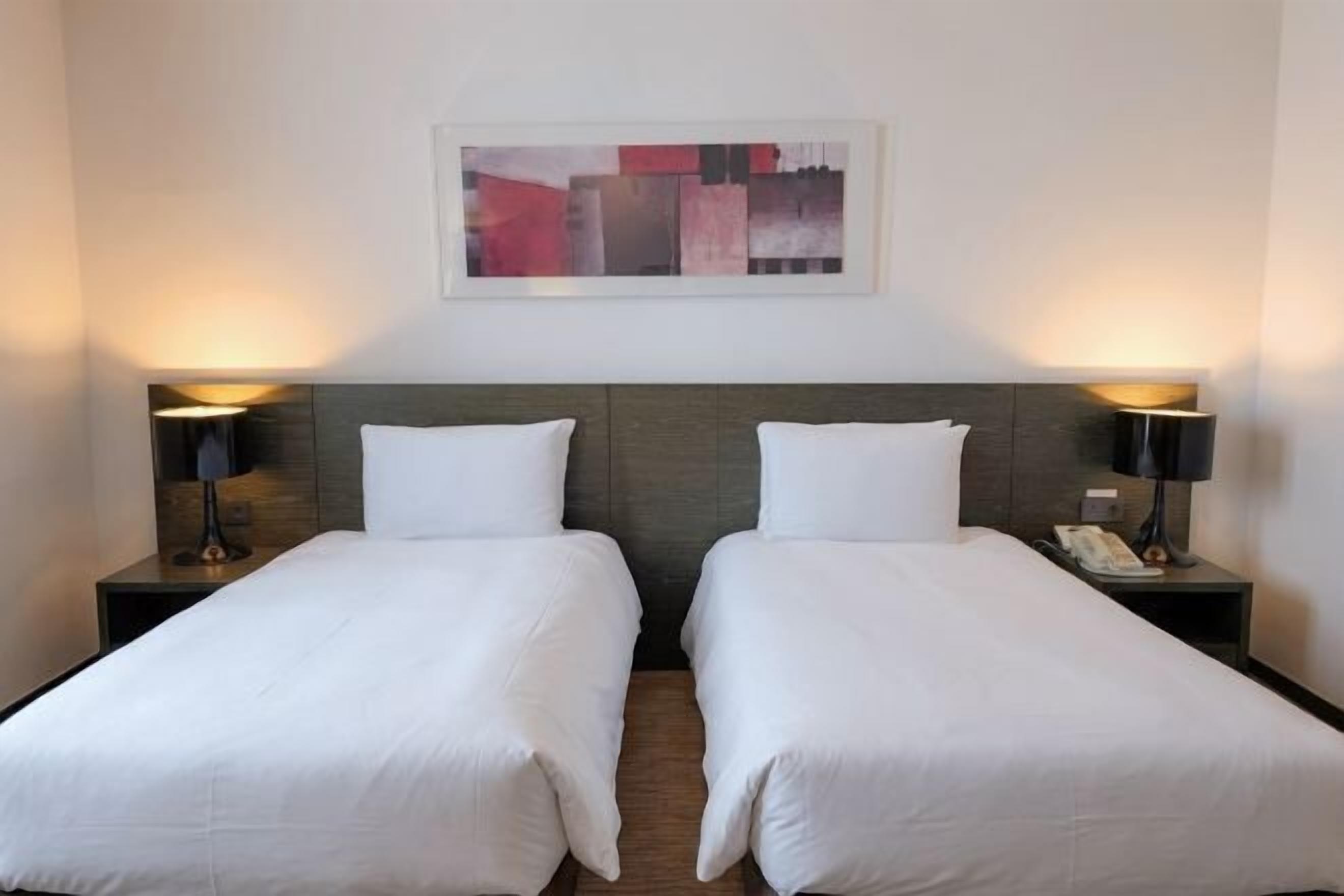 Premium bedding, free minibar items, in-room safe, desk