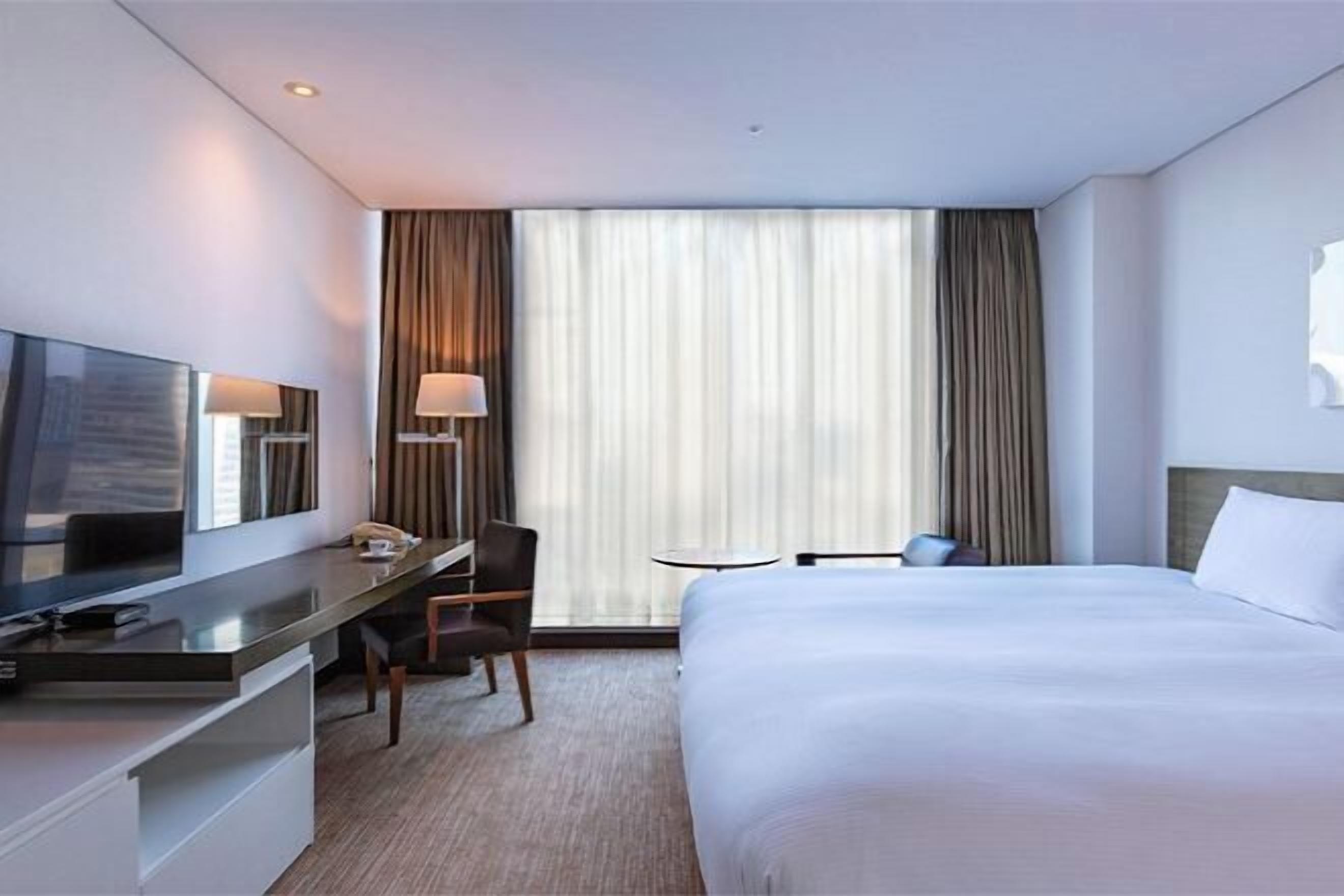 Premium bedding, free minibar items, in-room safe, desk