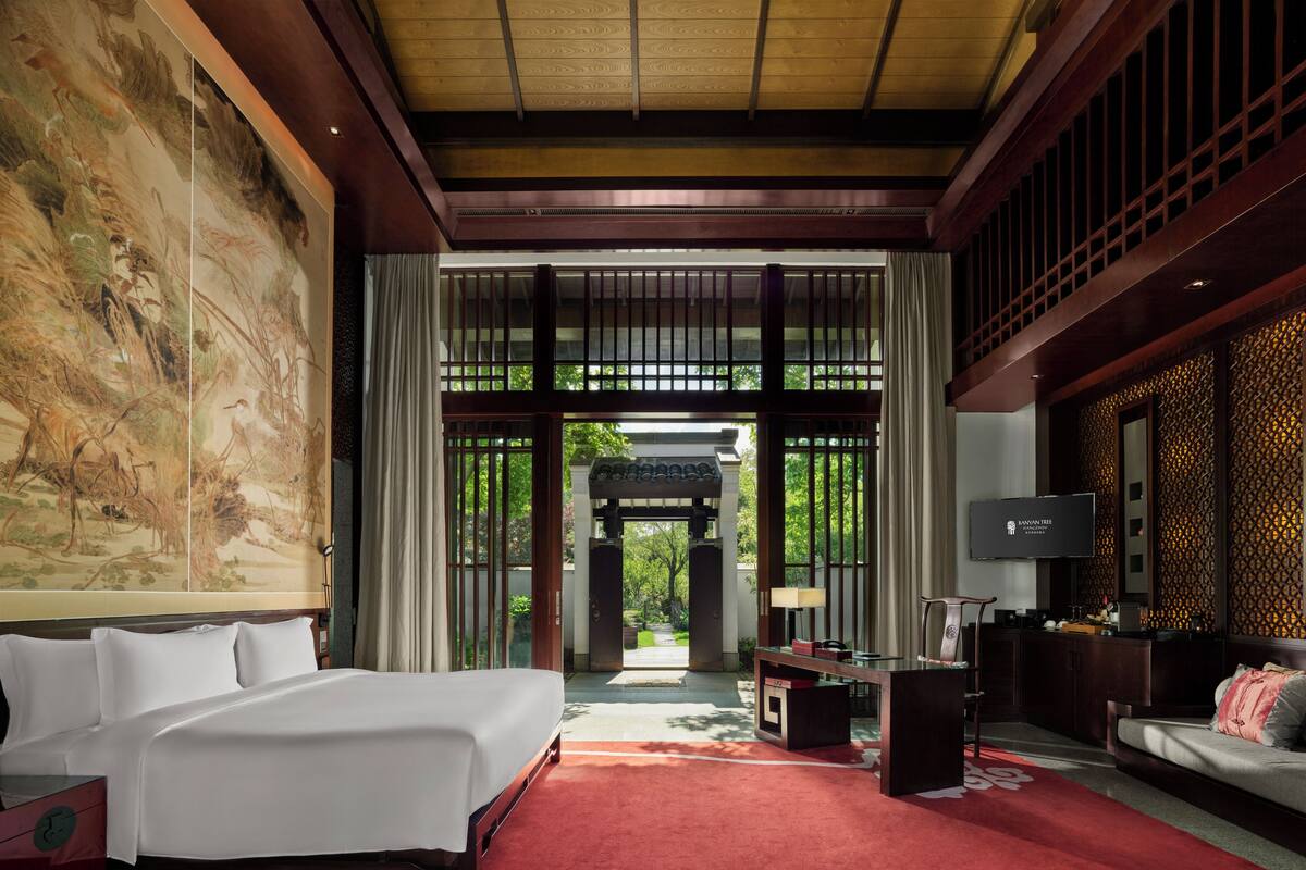 Premier Water Villa, 1 King Bed, (Lake View) | Minibar, in-room safe, desk, laptop workspace
