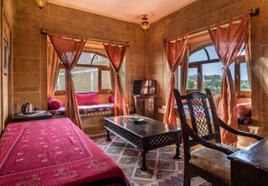 Deluxe Suite, 1 Bedroom | Living area | 22-inch LCD TV with digital channels, TV, pay films - Hotel Fifu (Jaisalmer)
