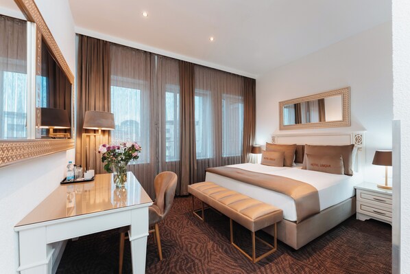 Premium bedding, in-room safe, individually decorated, desk