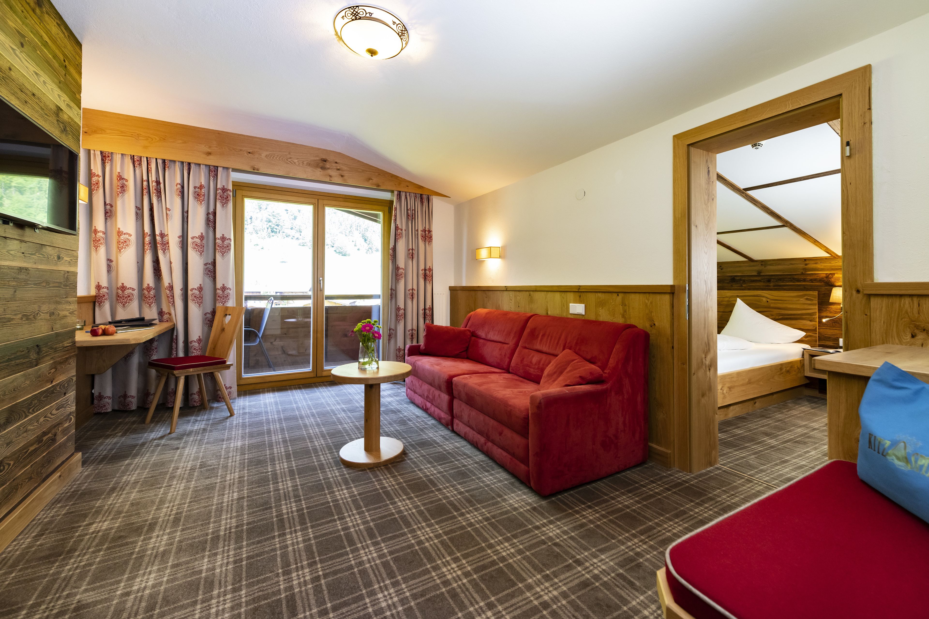 family suite, 1 bedroom, mountain view, mountainside (spielberg) | 1 bedroom, premium bedding, in-room safe, desk