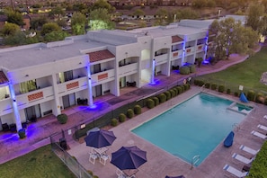 Outdoor pool, pool umbrellas, sun loungers