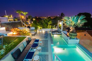 2 outdoor pools, open 8:00 AM to 7:00 PM, pool umbrellas, sun loungers