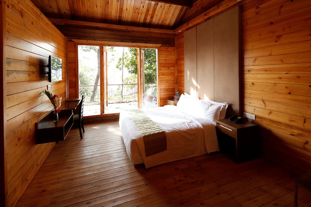 wooden cottage room | 1 bedroom, premium bedding, minibar, in-room safe
