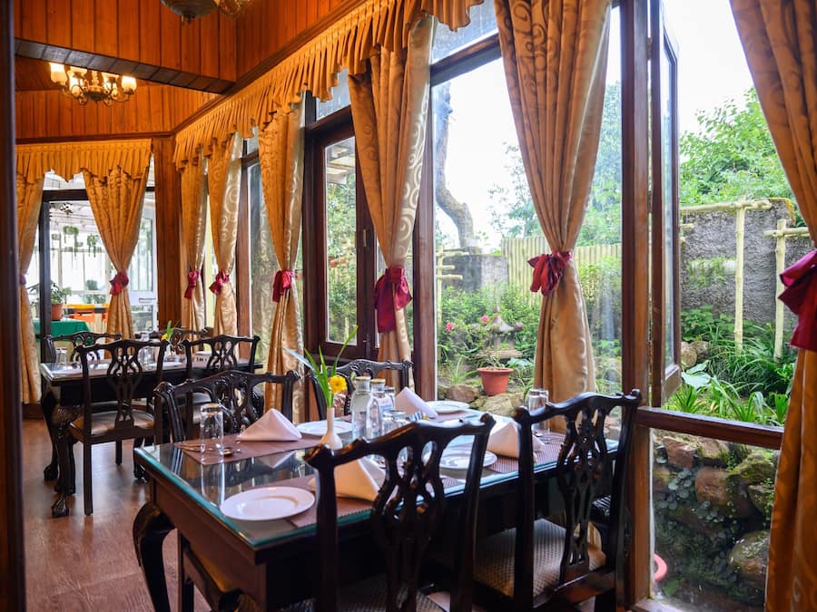 Breakfast, lunch, dinner served; local cuisine, garden views