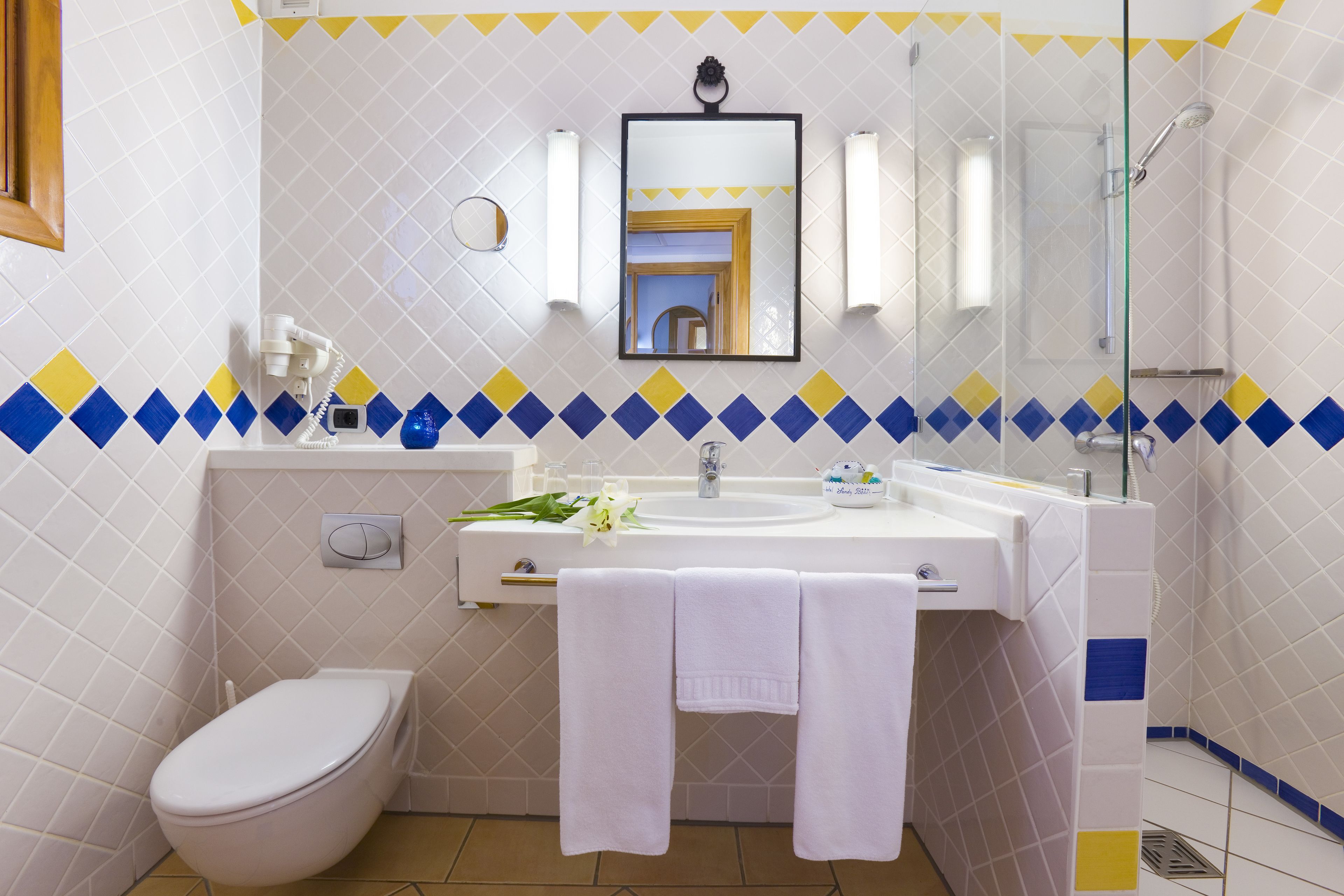 free toiletries, hair dryer, bathrobes, towels