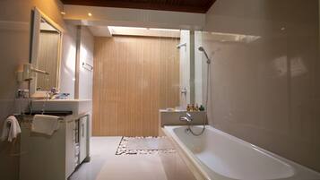 Separate tub and shower, free toiletries, hair dryer, bathrobes