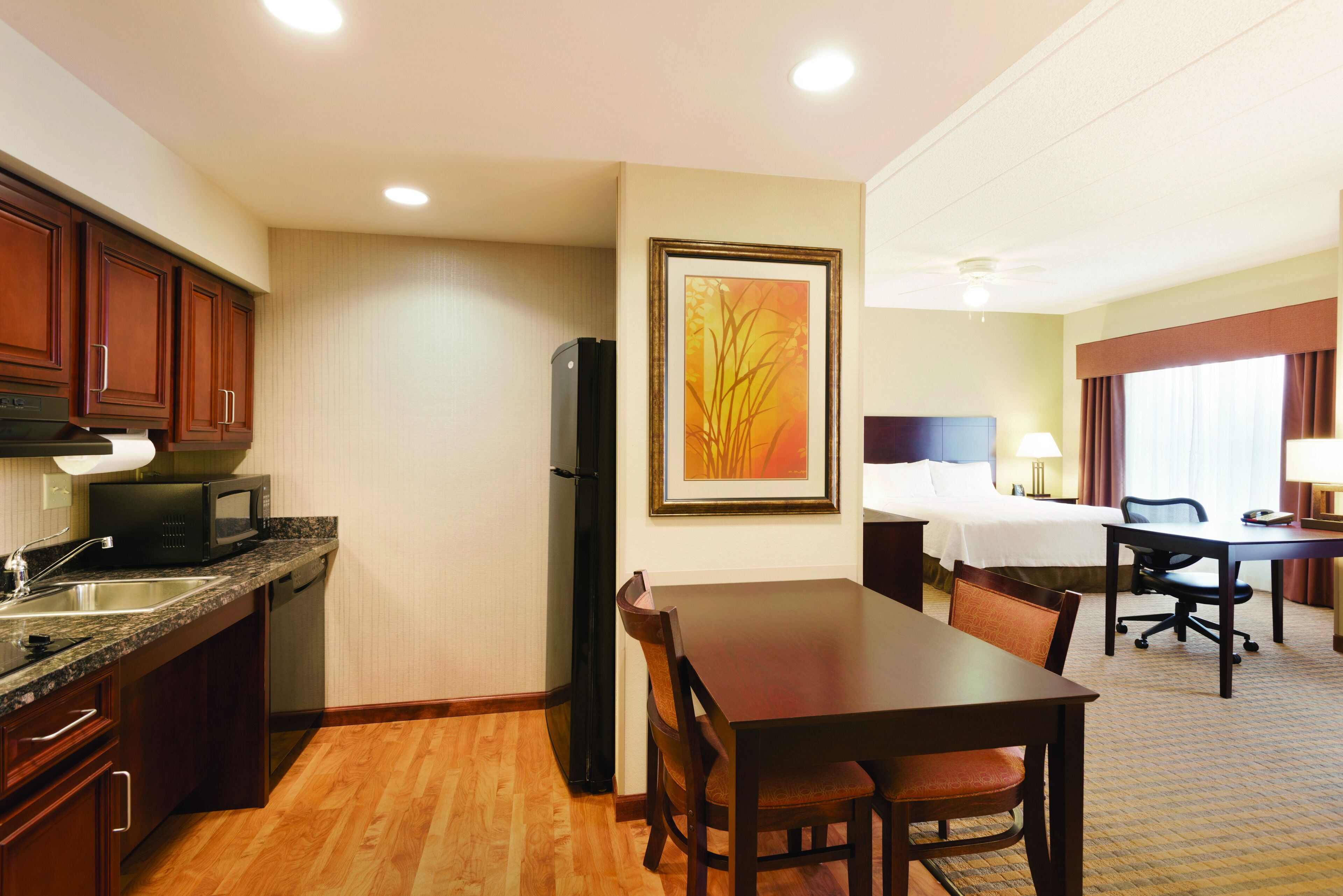 fridge, microwave, coffee/tea maker, cookware/dishes/utensils