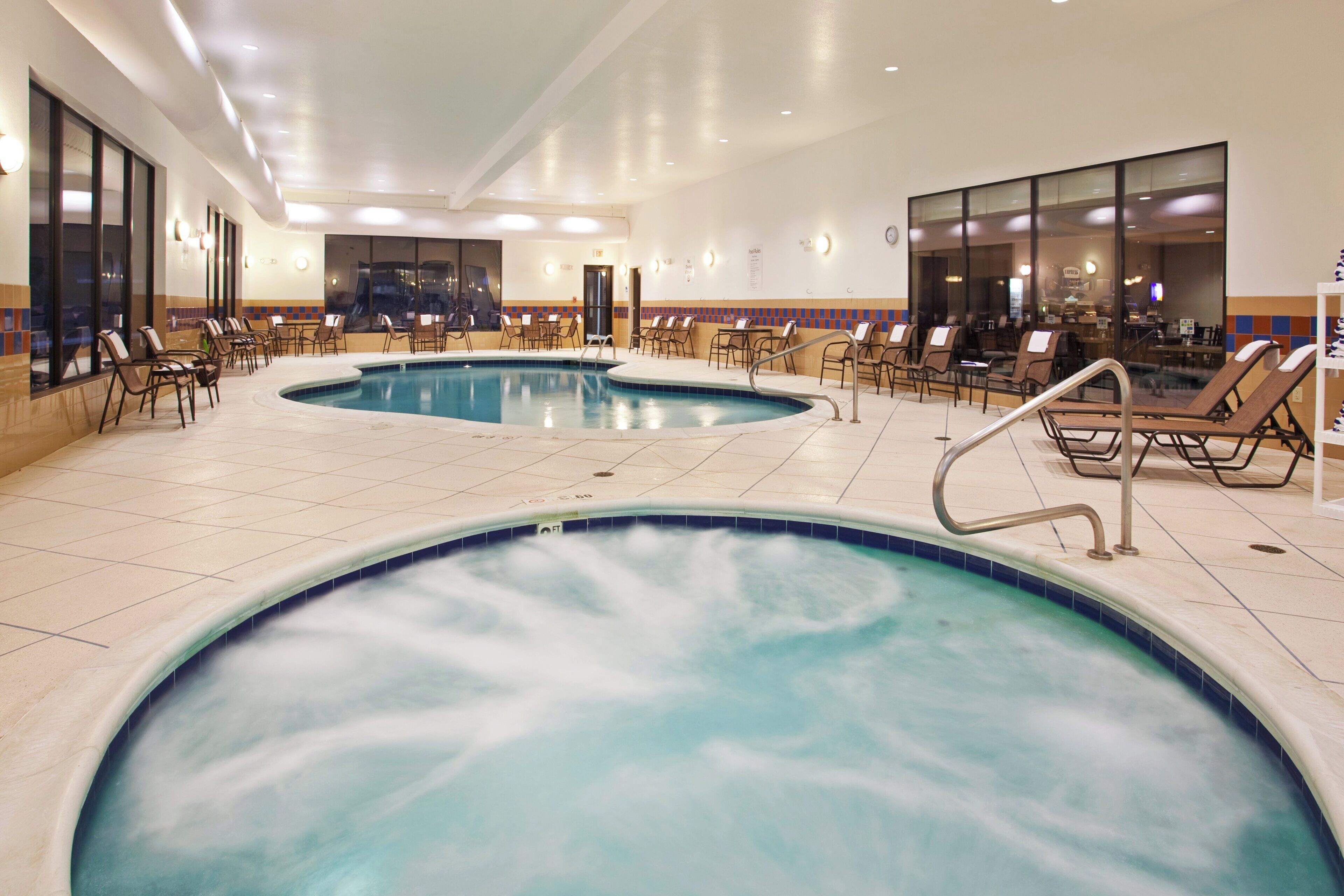 Indoor pool, open 7 AM to 11 PM, sun loungers