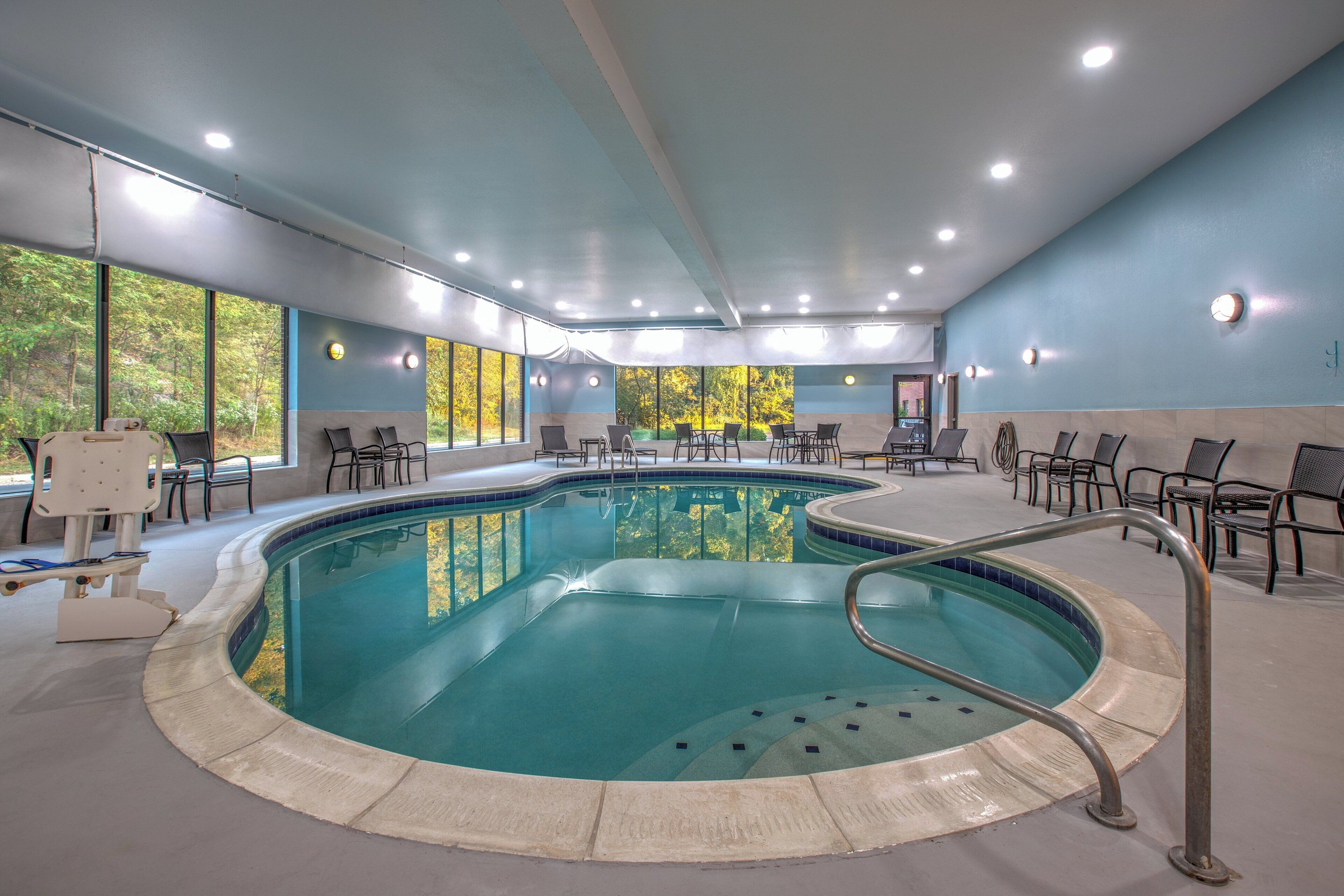 Indoor pool, open 7 AM to 11 PM, sun loungers