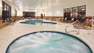 Indoor pool, open 7 AM to 11 PM, pool loungers