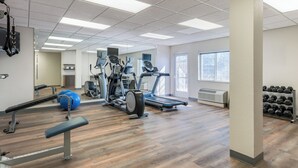A gym with exercise equipment, a treadmill, and a rack of dumbbells. - Candlewood Suites San Antonio NW Near Seaworld by IHG (San Antonio)