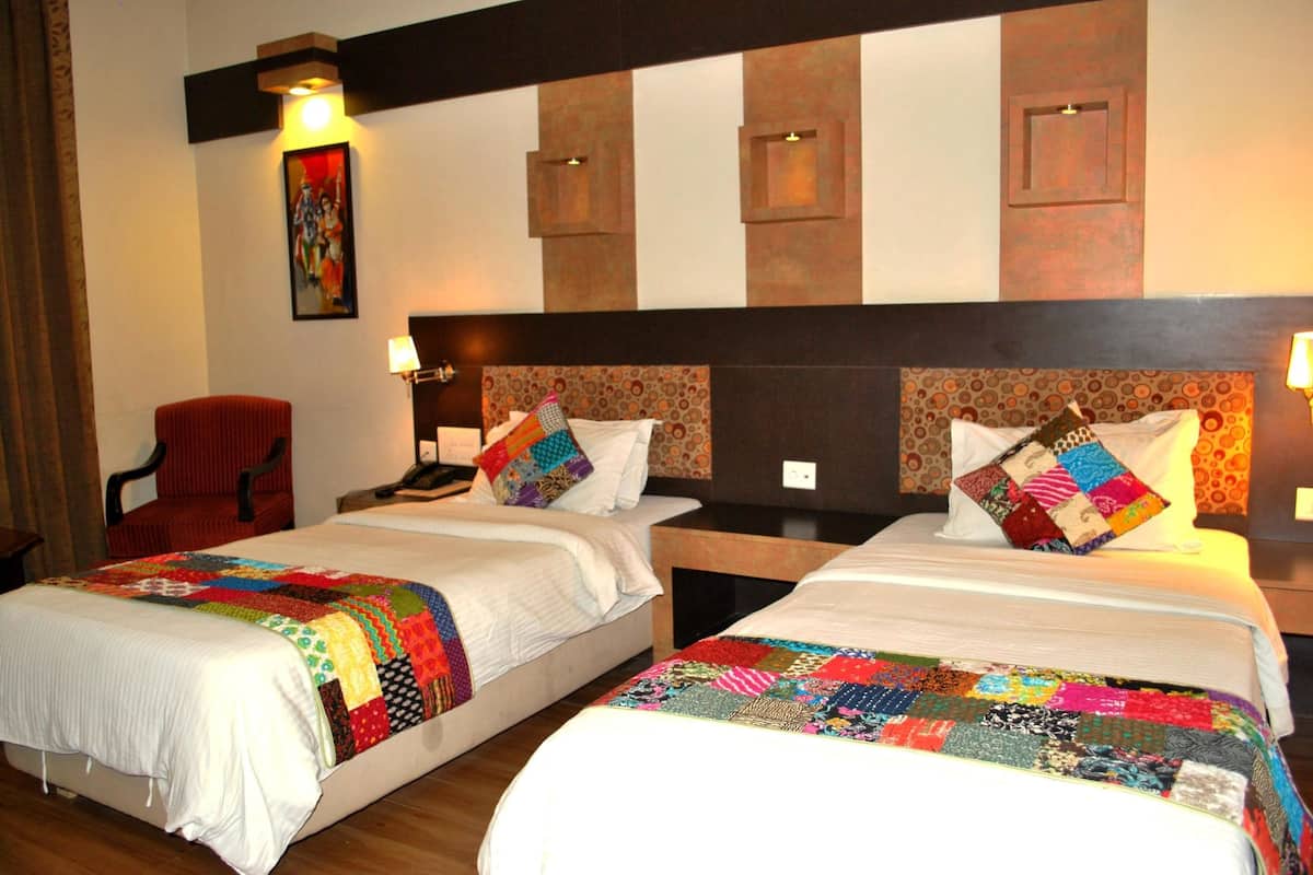 Premium bedding, Select Comfort beds, individually decorated, desk
