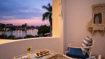 Elephanta Lake view suite with balcony | Premium bedding, in-room safe, desk, laptop workspace