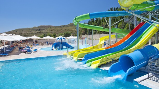 A water park with multiple slides and a pool area. - Kipriotis Aqualand by Anayia All Inclusive Resorts (Kos)