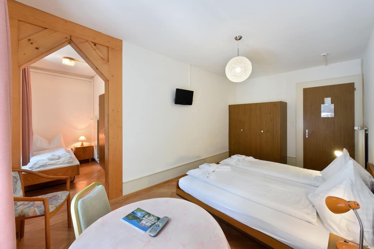 Standard Triple Room, Balcony | Living area | LCD TV