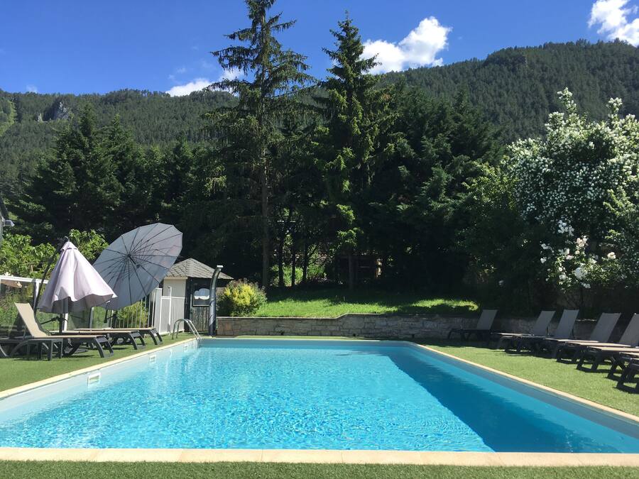 Seasonal outdoor pool, pool umbrellas, pool loungers