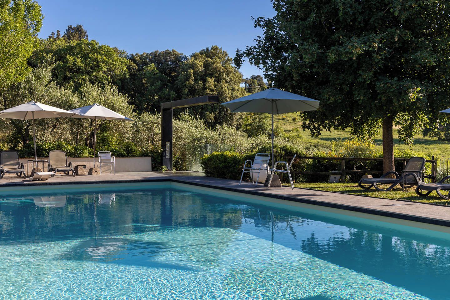Outdoor pool, open 8:00 AM to 8:00 PM, pool umbrellas, sun loungers