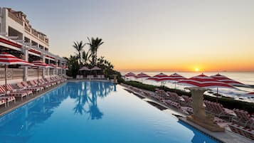 2 outdoor pools, pool umbrellas, pool loungers