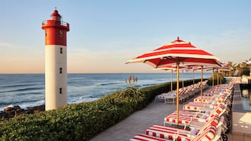 2 outdoor pools, pool umbrellas, pool loungers