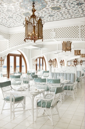 2 restaurants, breakfast, lunch, dinner served; Indian cuisine