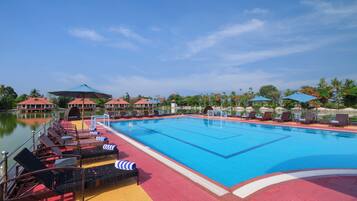 Outdoor pool, open 8 AM to 8 PM, free pool cabanas, pool umbrellas
