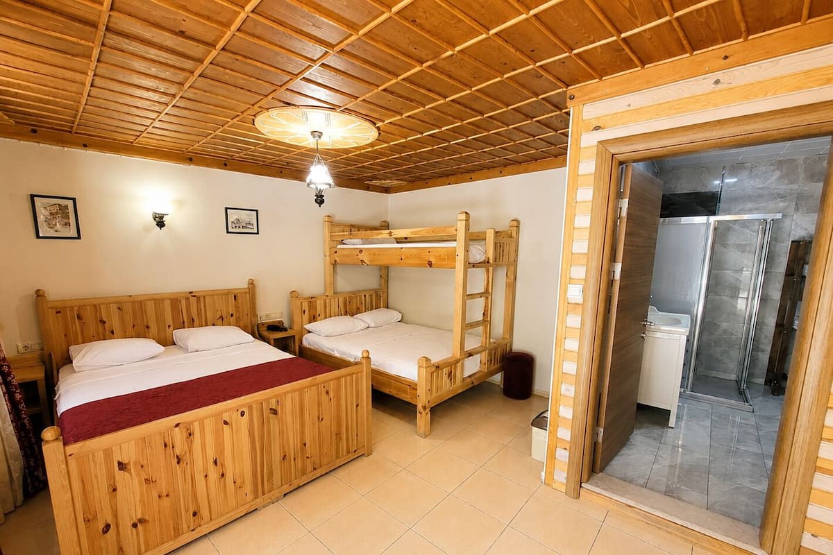 Family Room | Minibar, in-room safe, soundproofing, iron/ironing board (on request)