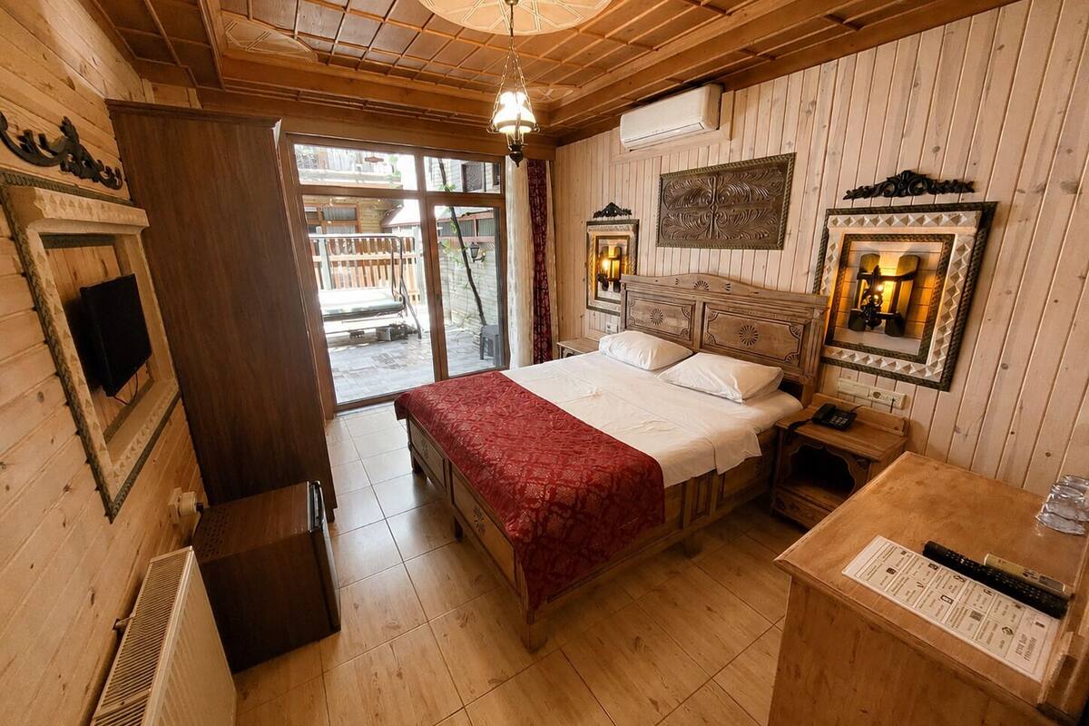 Double Room, Patio | Minibar, in-room safe, soundproofing, iron/ironing board (on request)