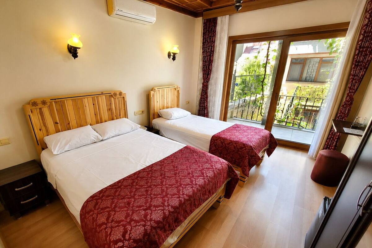 Standard Double or Twin Room | Minibar, in-room safe, soundproofing, iron/ironing board (on request)