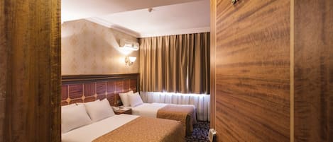 Minibar, bureau, rideaux occultants, lits bébé (gratuits)