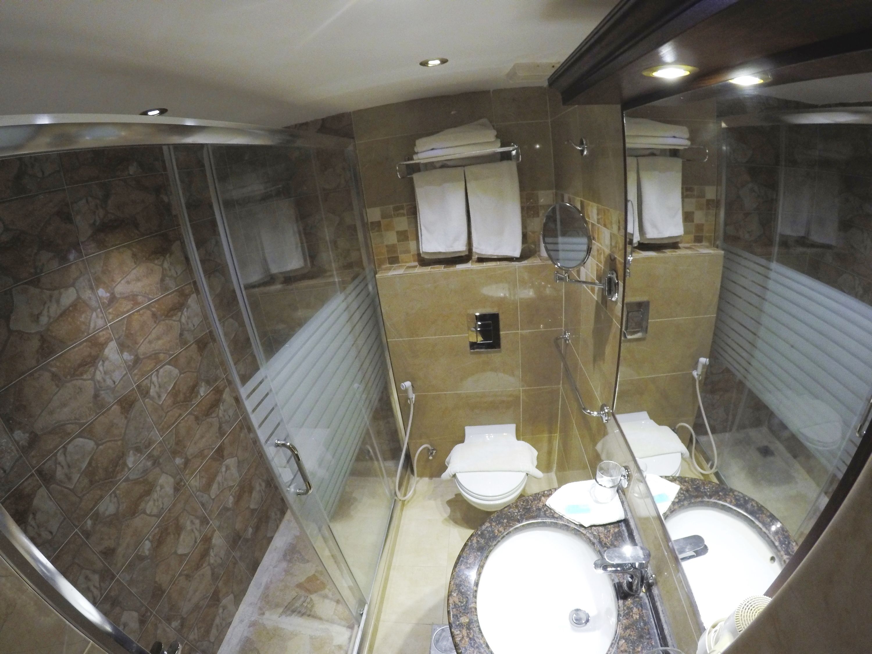 hydromassage showerhead, designer toiletries, hair dryer, bathrobes