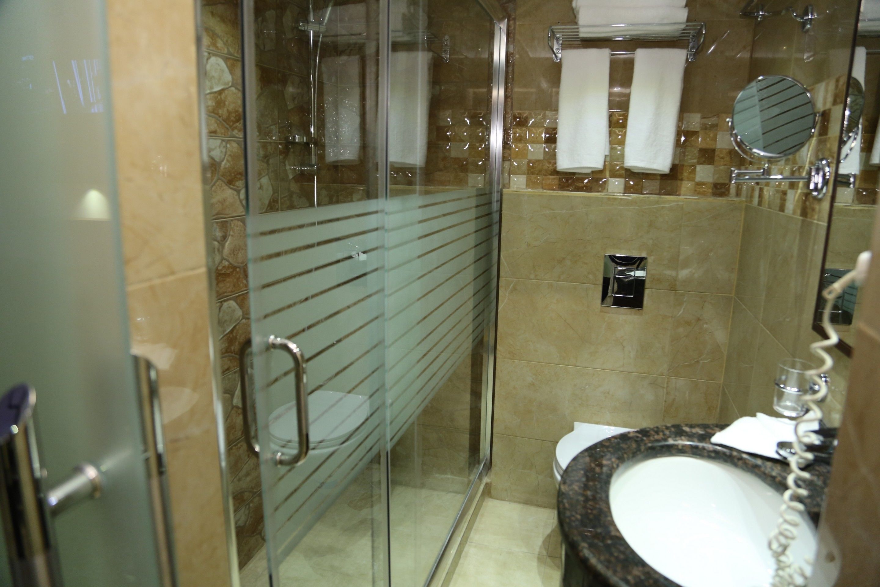 hydromassage showerhead, designer toiletries, hair dryer, bathrobes