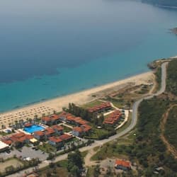 On the beach, sun-loungers, beach umbrellas, beach towels