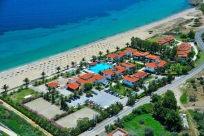 On the beach, sun loungers, beach umbrellas, beach towels