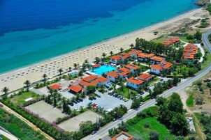 On the beach, sun loungers, beach umbrellas, beach towels