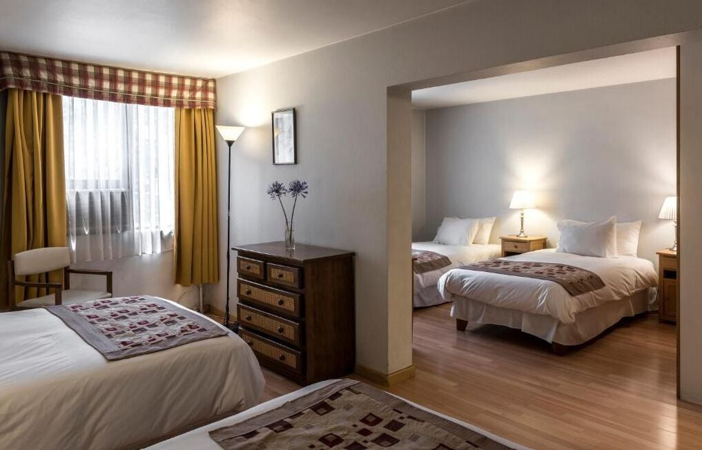 Quadruple Room | Minibar, in-room safe, individually decorated, individually furnished