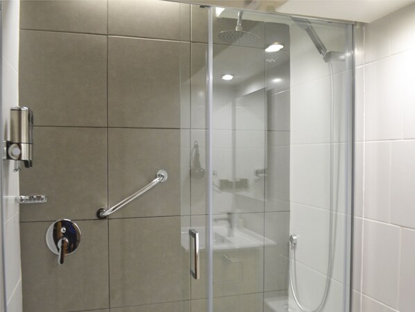 Shower, free toiletries, hair dryer, towels