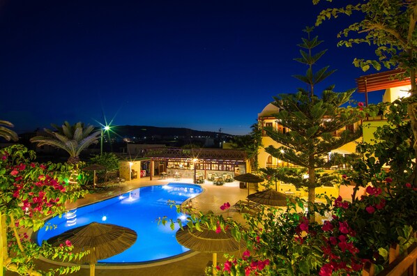 Outdoor pool, pool umbrellas, sun loungers