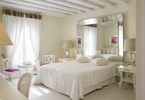 Egyptian cotton sheets, premium bedding, down duvets, memory-foam beds