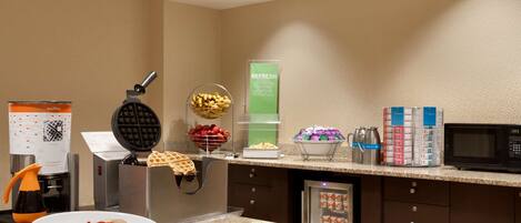 A hotel kitchen with waffle maker, waffle station, waffle basket, waffle plate, waffle dispenser, waffle iron, waffle box, waffle container, waffle tray, waffle basket, waffle plate, waffle iron, waffle box, waffle container, waffle tray, waffle basket, waffle plate, waffle iron, waffle box, waffle container, waffle tray, waffle basket, waffle plate, waffle iron, waffle box, waffle container, waffle tray, waffle basket, waffle plate, waffle iron, waffle box, waffle container, waffle tray, waffle basket, waffle plate, waffle iron, waffle box, waffle container, waffle tray, waffle basket, waffle plate, waffle iron, waffle box, waffle container, waffle tray, waffle basket, waffle plate, waffle iron, waffle box, waffle container, waffle tray, waffle basket, waffle plate, waffle iron, waffle box, waffle container, waffle tray, waffle basket, waffle plate, waffle iron, waffle box, waffle container, waffle tray, waffle basket, waffle