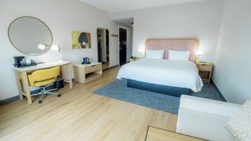 Premium bedding, pillow-top beds, desk, laptop workspace