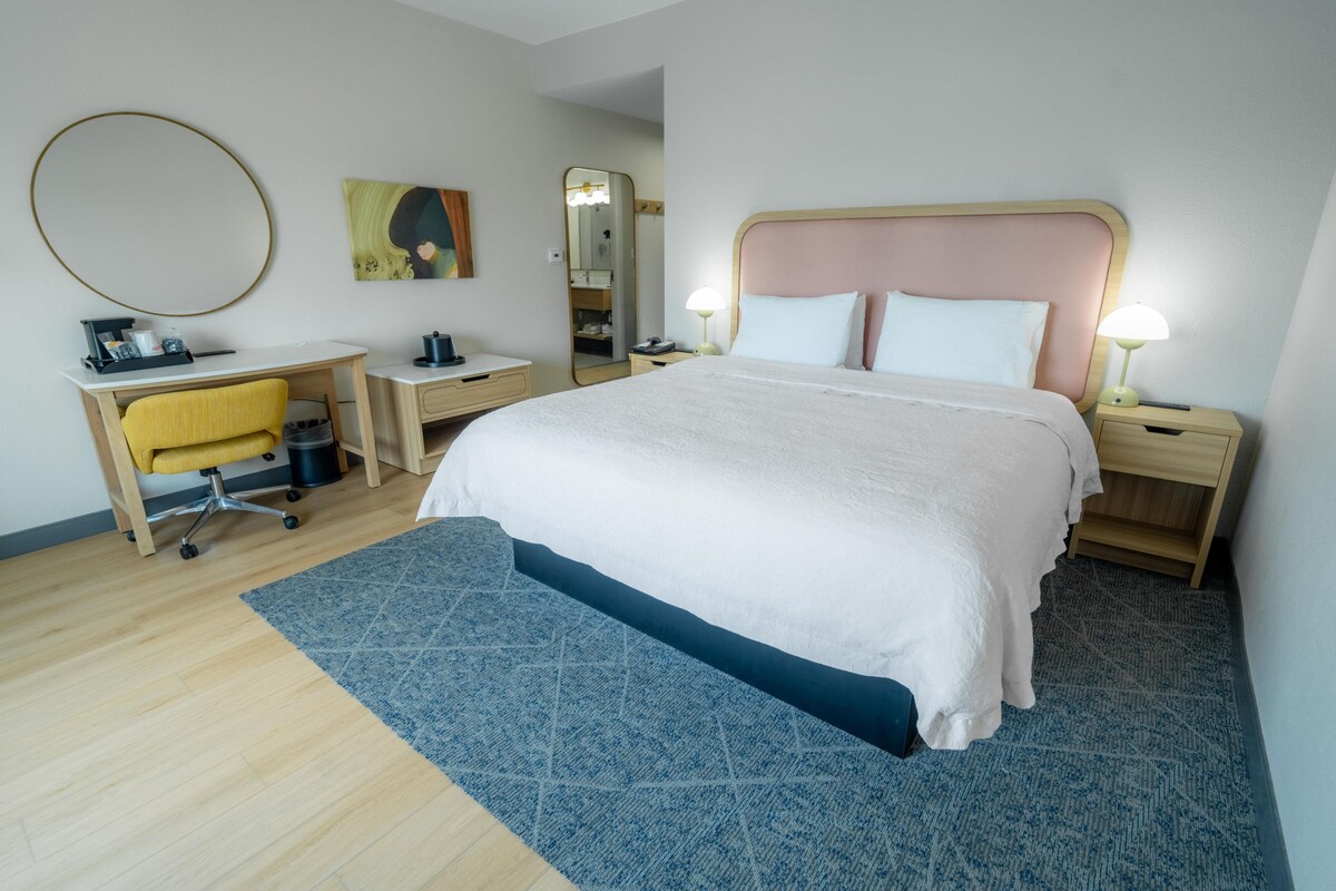 Premium bedding, pillowtop beds, desk, laptop workspace