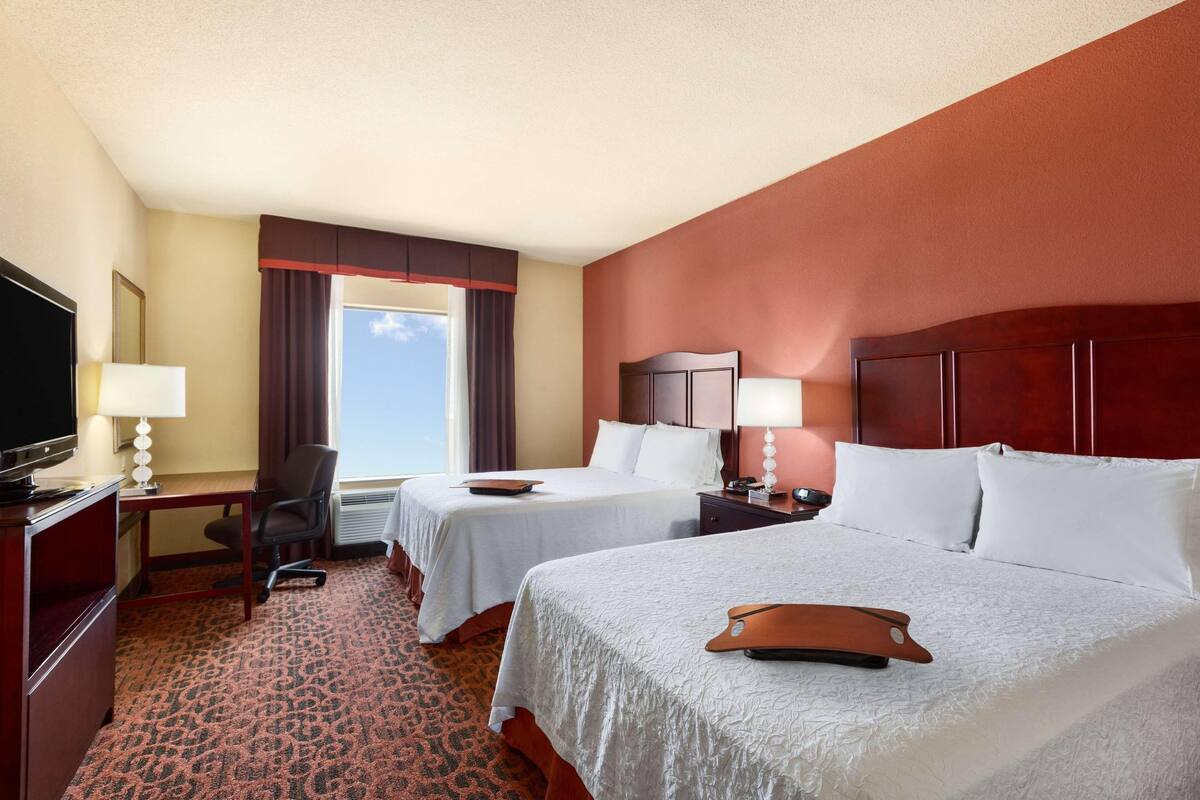 Premium bedding, pillowtop beds, desk, laptop workspace