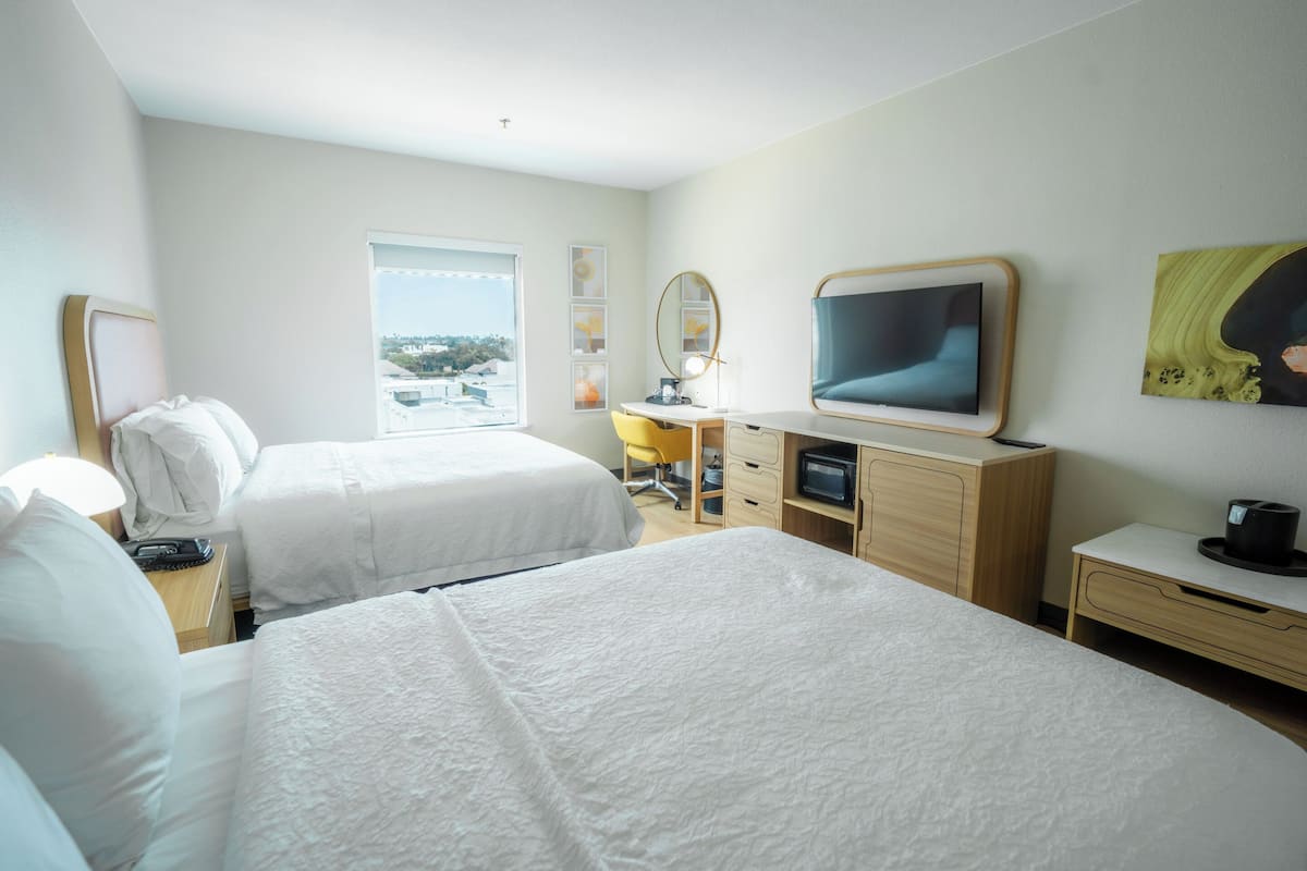 Premium bedding, pillowtop beds, desk, laptop workspace