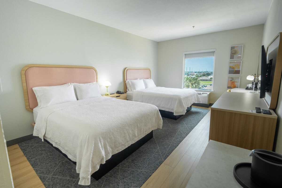 Premium bedding, pillowtop beds, desk, laptop workspace