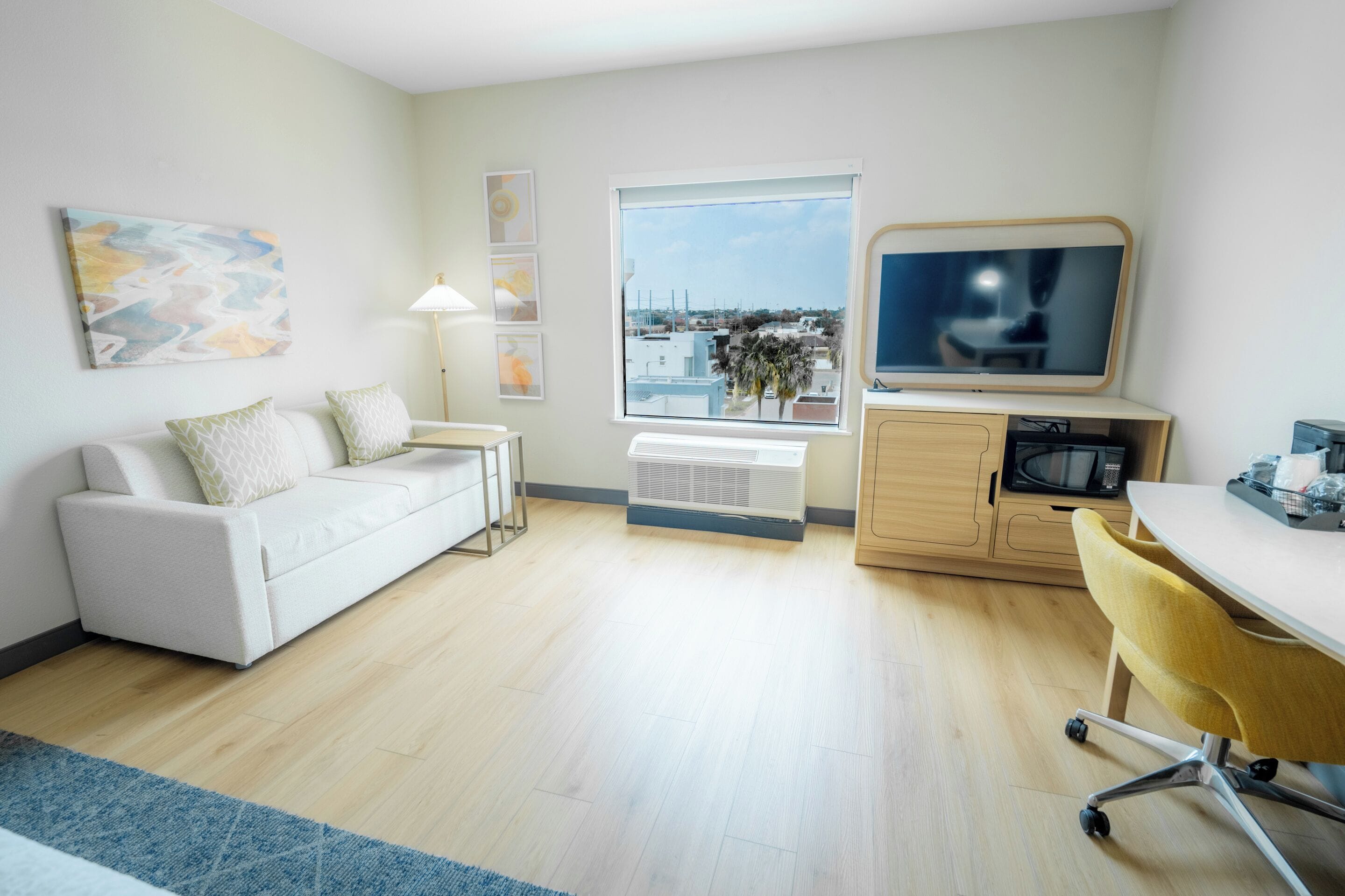 Premium bedding, pillowtop beds, desk, laptop workspace