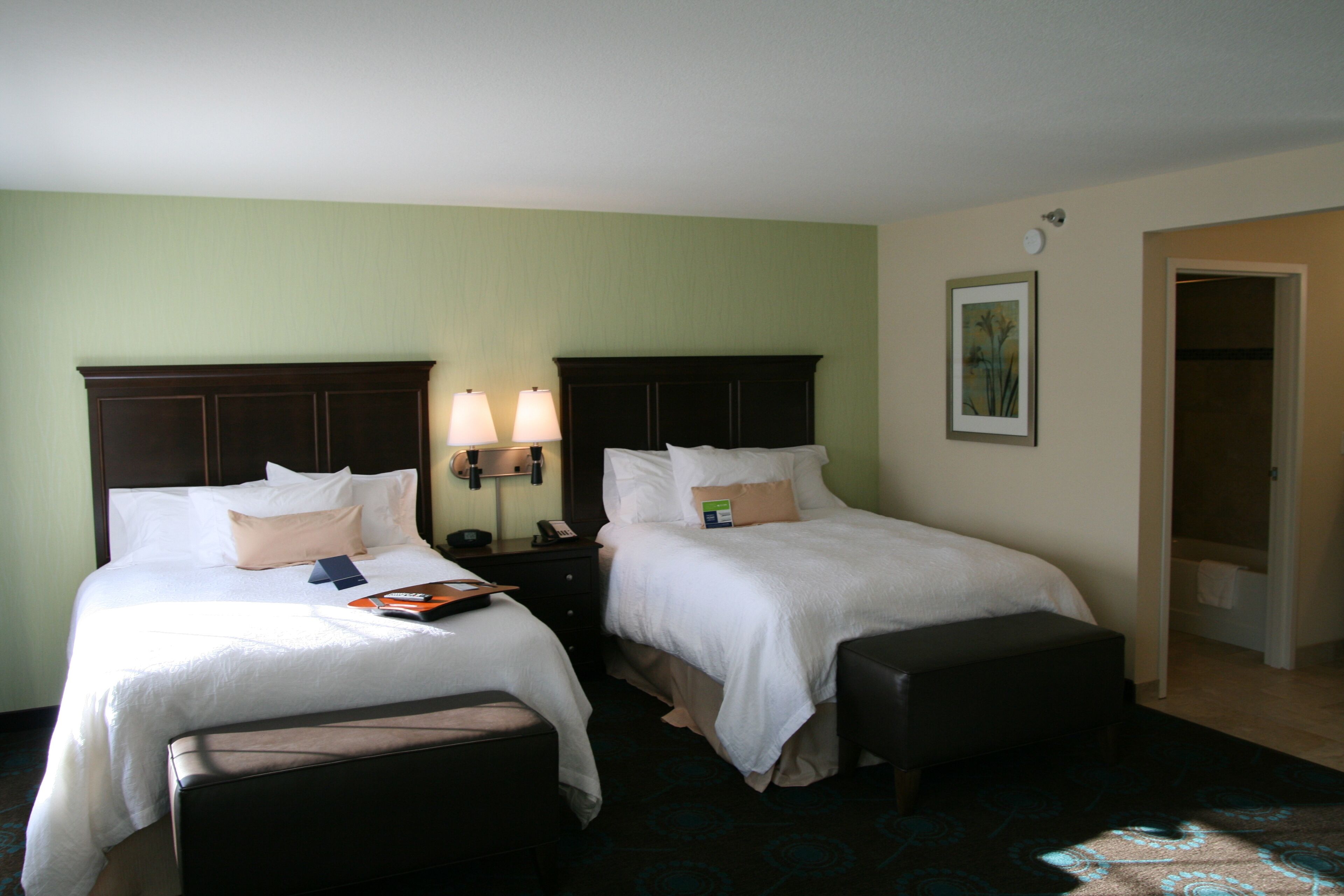 two queens | desk, laptop workspace, iron/ironing board, free cots/infant beds