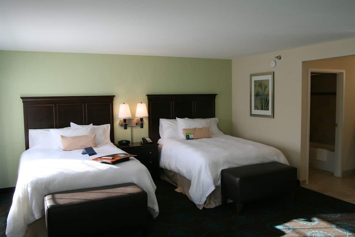 two queens | desk, laptop workspace, iron/ironing board, free cots/infant beds