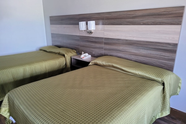 Standard Room, 2 Full Beds | WiFi (free), bed sheets